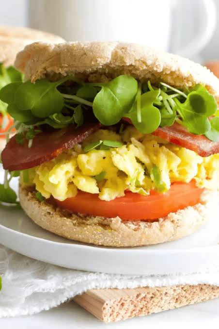 Breakfast sandwich topped with microgreens